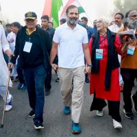 Former Navy Chief Admiral L Ramdas and his wife Lalita with Rahul Gandhi