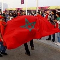 People with flag of Morocco/Reuters