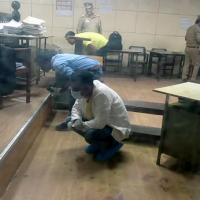 Forensic team examines crime scene at the Lucknow civil court