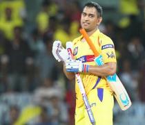 PHOTOS: Dhoni keeps focus by humming songs