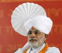 Modi asks small traders to compete with big retailers