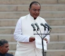 Jaitley promises to contain inflation, promote growth