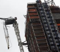 Sandy batters NY: Crane dangles from high-rise, cars float