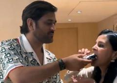 'Happy birthday Mahi!': Sakshi touches Dhoni's feet!