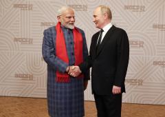 Modi Stands Out In A Room Of Suits