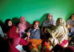 A Mother Weeps For Her Murdered Child