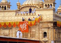 Golden Temple Covered In Flowers