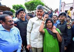 Naidu Uses A JCB To Meet Flood Affected