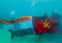 Hoisting The Tiranga Underwater