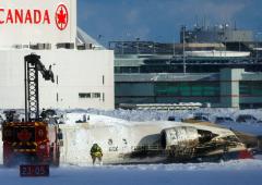 Plane crashes, flips on landing in Canada, 18 injured