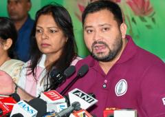 Photos of INDIA leaders missing from Tejashwi posters