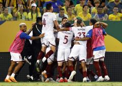 Football PIX: Argentina win; Venezuela hold Brazil