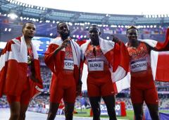 PIX: Canada win 4x100 as US blow it; Chebet double