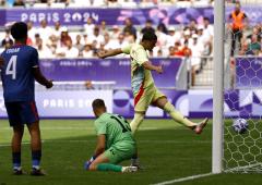 Olympics soccer: France struggle; Spain, Japan in QF