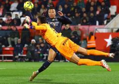 PIX: Real Madrid held to draw; Napoli down Roma