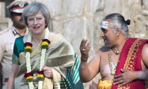 Hit or Miss? British PM Theresa May in a sari!