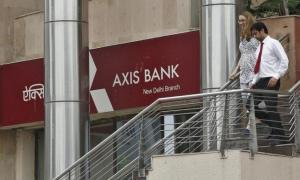 Axis Bank dismisses 24 staffers, suspends 50 accounts