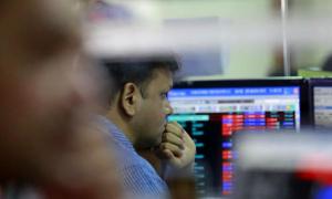 Sensex, Nifty settle lower in volatile trade