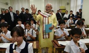 Modi plays flute, narrates story of Lord Krishna at Japanese school