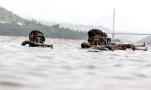 Commandos Conduct Underwater Exercises