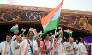 PIX: Flag bearers Sindhu, Kamal lead India in parade