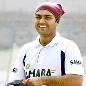 Dhoni loses top spot, Sehwag rises in ODI rankings