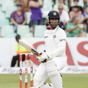 Pujara adjudged out for 'handling the ball'