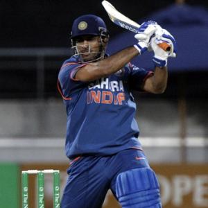 Dhoni century lifts India to victory