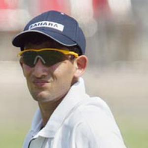 Agarkar fined for showing dissent