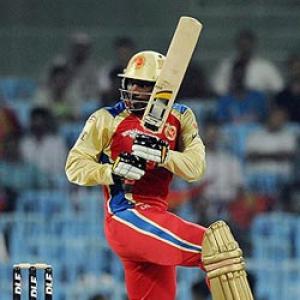 Gayle storm powers RCB past 200 vs Somerset