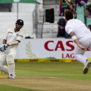 PHOTOS: Morkel removes Dhawan; Vijay, Pujara steady India