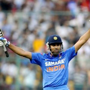 Rohit's double century helps India beat Australia and clinch ODI series