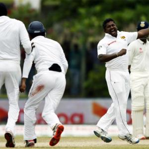 Herath spins Sri Lanka to comeback win as India's batting flops