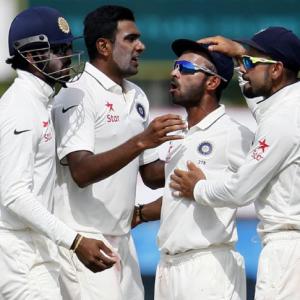 Bowlers keep Lanka in check after Saha swells India's total