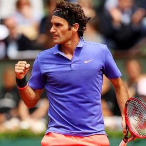 New racquet-wielding Federer says never felt better before Wimbledon