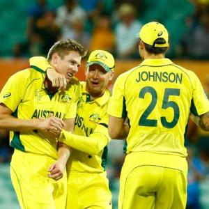 Australia knock defending champs India out of World Cup
