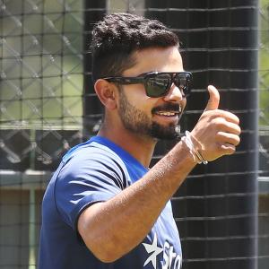 Captain Kohli cuts special '500th Test' cake in Kanpur