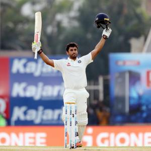 PHOTOS: Nair's triple century propels India to record total