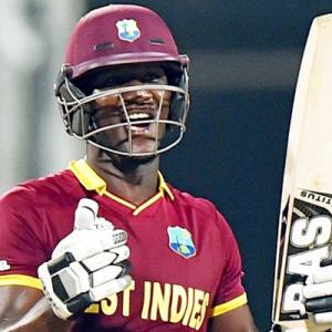 World T20: West Indies ride on Sammy's fifty to stun Aussies
