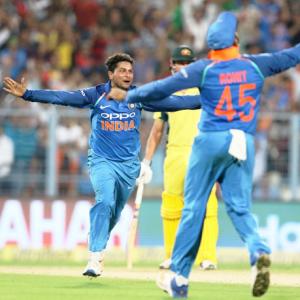 PIX: Kuldeep 'tricks' as India down Aus by 50 runs, lead series 2-0
