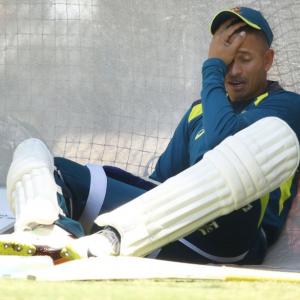 Australian cricketer Khawaja must sort out off-field problems