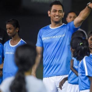 PIX: Dhoni takes to the football field