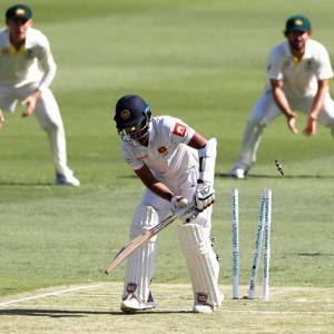 PIX: Australia's pace attack rattles Sri Lanka in Brisbane