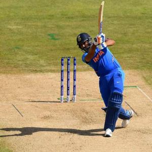 PIX: India dump Bangladesh to seal semis spot