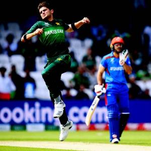 PHOTOS: Pakistan edge Afghanistan to stay alive