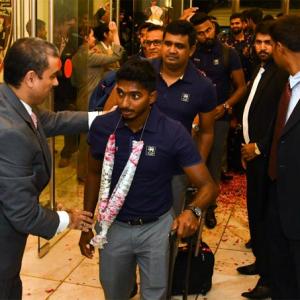 PIX: SL cricketers leave for Pak despite concerns