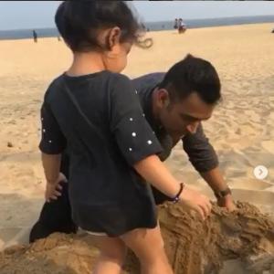 PIX: When Dhoni plays doting dad