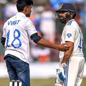 Pitch Invader Touches Rohit's Feet