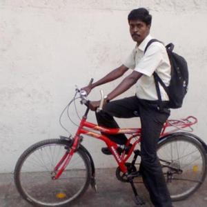 The MBA who runs a library on a bicycle