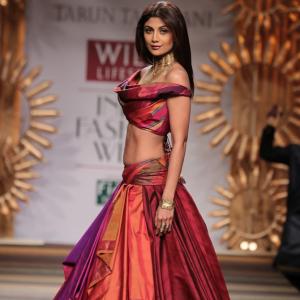 With a bang! Washboard abs open India Fashion Week